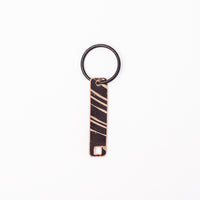Load image into Gallery viewer, Dark Drum Key - Reclaimed Cymbal Accessory