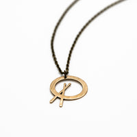 Load image into Gallery viewer, Mini Cross Stick - Reclaimed Cymbal Necklace