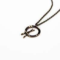 Load image into Gallery viewer, Dark Mini Cross Stick - Reclaimed Cymbal Necklace