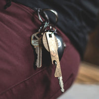 Load image into Gallery viewer, Eidola Keychain - Reclaimed Cymbal Bottle Opener